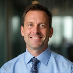 Professional headshot of Mark Meier, Senior Financial Analyst